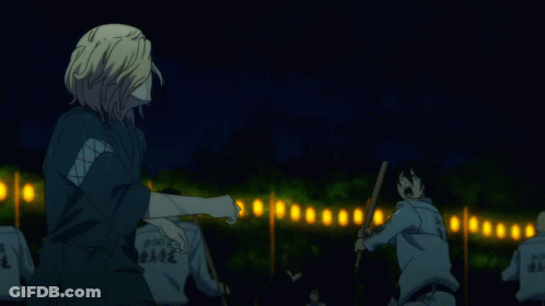 A Man Wearing A Shirt That Says ' Police ' On It Is Fighting Another Man GIF