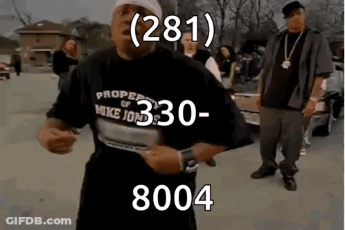 A Man Wearing A Shirt That Says Proper Of Mike Jones Is Dancing In A Parking Lot . GIF