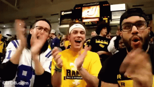 A Man Wearing A Shirt That Says Ran Is Clapping GIF