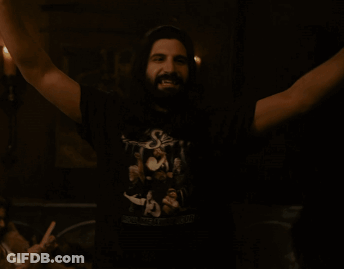 A Man Wearing A Shirt That Says ' Rolling Away ' On It GIF