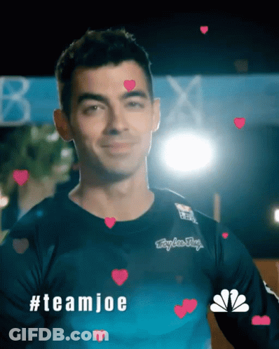 A Man Wearing A Shirt That Says Team Joe On It GIF