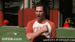 A Man Wearing A Shirt That Says Texas Is Standing On A Field GIF