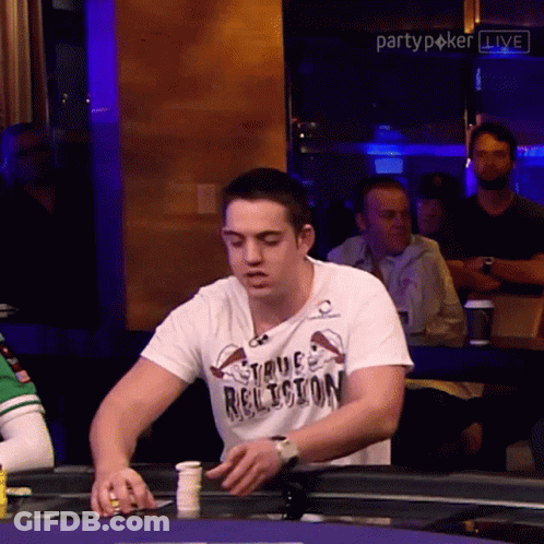 A Man Wearing A Shirt That Says True Religion Playing Poker GIF