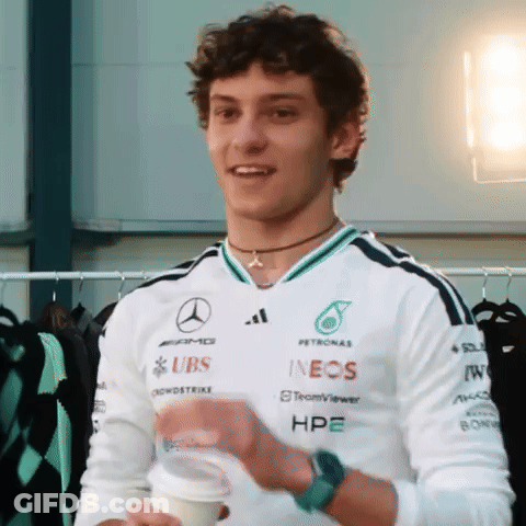 A Man Wearing A Shirt That Says Ubs And Ineos On It GIF