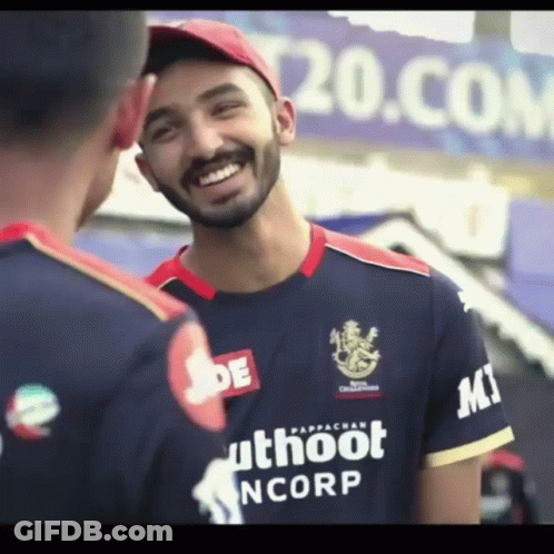 A Man Wearing A Shirt That Says Uthoot Ncorp GIF