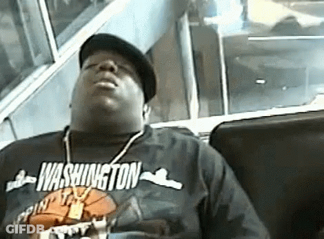 A Man Wearing A Shirt That Says Washington On It GIF