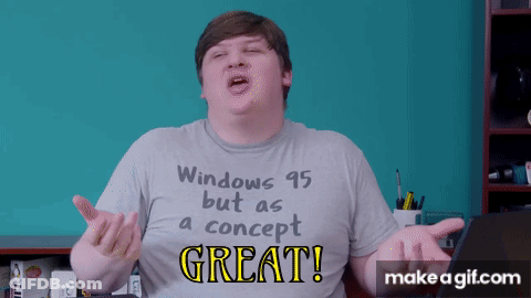A Man Wearing A Shirt That Says " Windows 95 But As A Concept Great " GIF