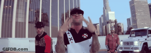 A Man Wearing A Shirt That Says X-X-X On It GIF