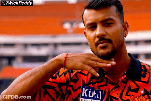 A Man Wearing A Shirt With A Label That Says " Kuhl " On It GIF