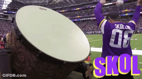 A Man Wearing A Skoll Jersey Stands On A Football Field GIF