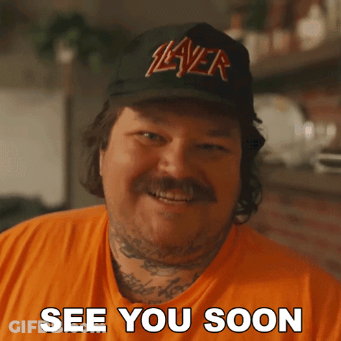A Man Wearing A Slayer Hat Is Smiling And Says See You Soon GIF