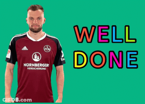 A Man Wearing A Soccer Jersey That Says Nurnberger Versicherung GIF