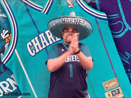 A Man Wearing A Sombrero And A Charlotte Hornets Jersey Clapping His Hands GIF