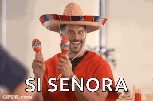 A Man Wearing A Sombrero Is Holding Maracas And Smiling With The Words Si Senora Behind Him GIF