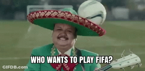 A Man Wearing A Sombrero Is Playing A Guitar And Singing . GIF