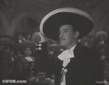 A Man Wearing A Sombrero Says Que Me Maten De Una Vez In A Black And White Photo GIF