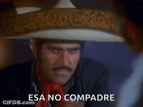A Man Wearing A Sombrero With The Words Esa No Compadre Written On It GIF