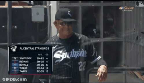 A Man Wearing A Southside Baseball Uniform Stands In The Dugout GIF