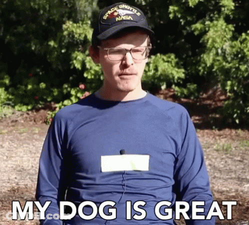 A Man Wearing A Space Shuttle Nasa Hat And Glasses Says My Dog Is Great GIF