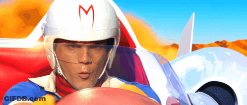 A Man Wearing A Speed Racer Helmet With A Red M On It GIF