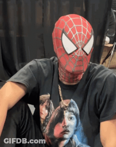 A Man Wearing A Spider-Man Mask And A Black T-Shirt GIF