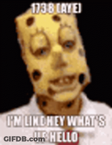 A Man Wearing A Spongebob Mask With Holes In It Is Talking . GIF