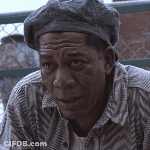 A Man Wearing A Striped Shirt And A Gray Hat Has The Word Morren On His Shirt GIF