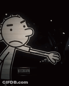 A Man Wearing A Striped Shirt And Tie Looks At The Camera GIF