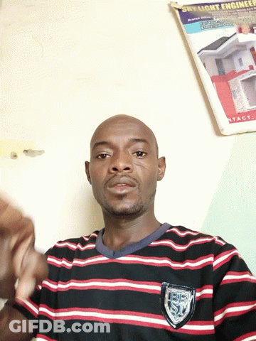 A Man Wearing A Striped Shirt Has A Patch On His Chest That Says ' Usc ' On It GIF