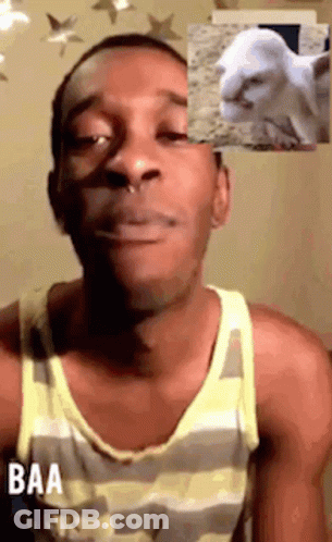 A Man Wearing A Striped Tank Top Says Baa In Front Of A Picture Of A Goat GIF