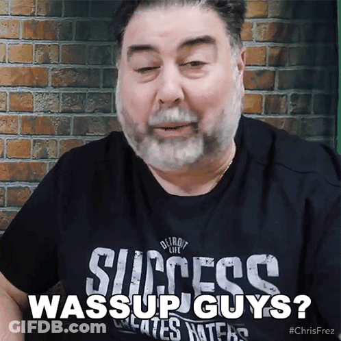 A Man Wearing A Success Wassup Guys Shirt GIF