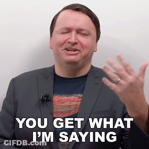 A Man Wearing A Suit And A Microphone Says You Get What I 'M Saying GIF