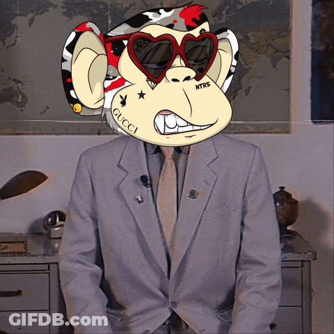 A Man Wearing A Suit And Tie Has A Monkey Face On His Head With The Word Gucci On It GIF