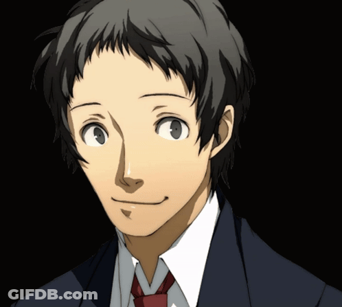 A Man Wearing A Suit And Tie Is Smiling GIF