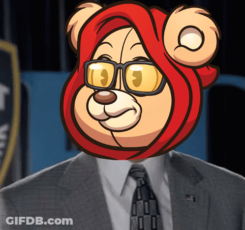 A Man Wearing A Suit And Tie With A Teddy Bear Mask On His Head GIF