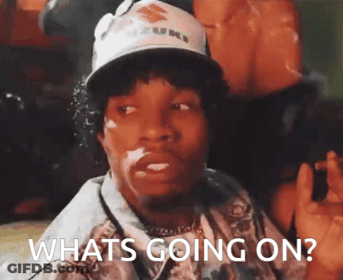 A Man Wearing A Suzuki Hat Says " Whats Going On " GIF