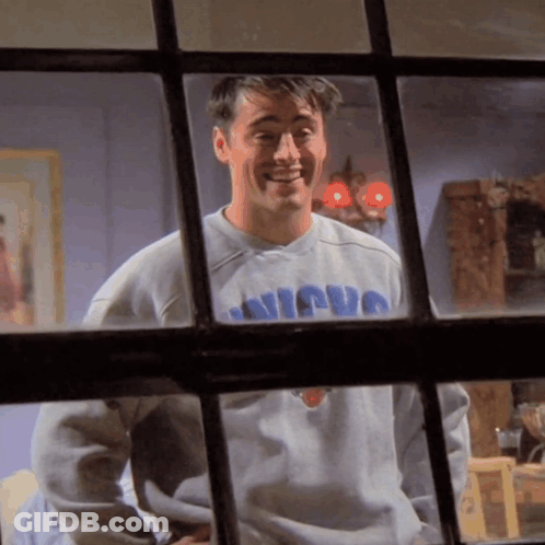 A Man Wearing A Sweater That Says Nicuo On It GIF