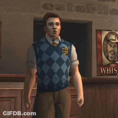 A Man Wearing A Sweater Vest With A Crest On It GIF