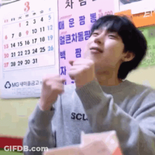 A Man Wearing A Sweater With The Word Scl On The Front GIF