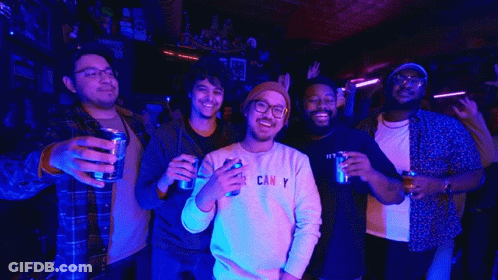A Man Wearing A Sweatshirt That Says " Can Y " Holds A Can Of Beer GIF