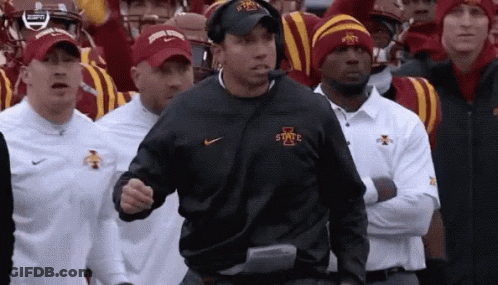 A Man Wearing A Sweatshirt That Says Iowa State GIF