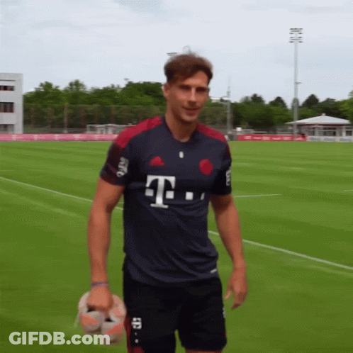 A Man Wearing A T-Mobile Jersey Stands On A Soccer Field GIF