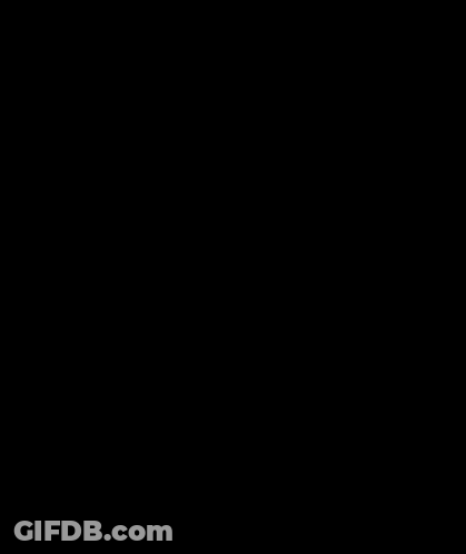 A Man Wearing A T-Shirt That Says Cannibal Romance GIF