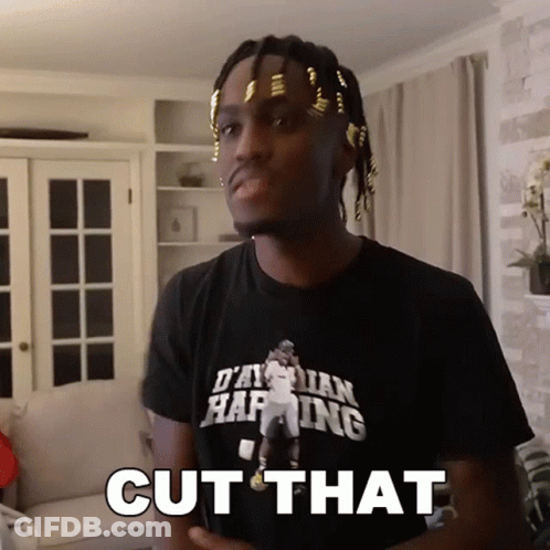 A Man Wearing A T-Shirt That Says ' Cut That ' On It GIF