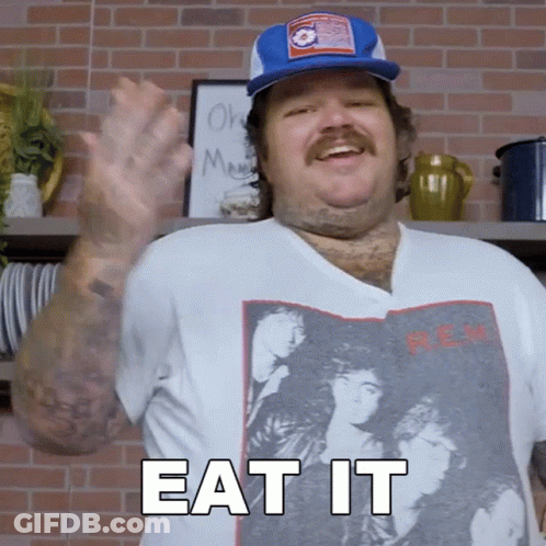 A Man Wearing A T-Shirt That Says " Eat It " GIF