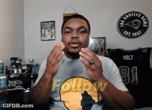 A Man Wearing A T-Shirt That Says Follow On It GIF