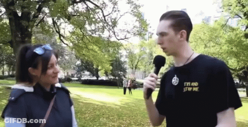 A Man Wearing A T-Shirt That Says I 'M And Stop Me GIF