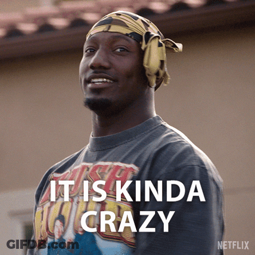 A Man Wearing A T-Shirt That Says It Is Kinda Crazy On It GIF