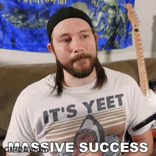 A Man Wearing A T-Shirt That Says It 'S Yeet GIF