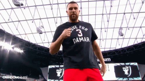A Man Wearing A T-Shirt That Says Live For 3 Damar GIF